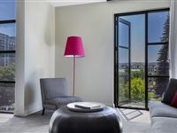 Mantra-Hindmarsh-Square-2Bedroom-Queen-Lounge